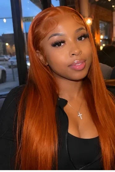 HD Lace Ginger Orange Frontal Wig 180% Density - woman wearing vibrant ginger orange straight lace front wig with black top, outdoor evening setting