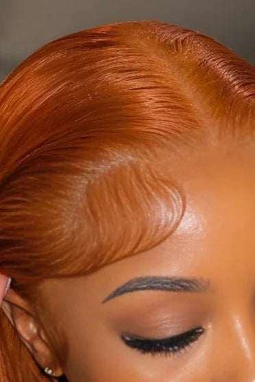 HD Lace Ginger Orange Frontal Wig 180% Density - close-up of glossy straight ginger orange hair texture and HD lace part