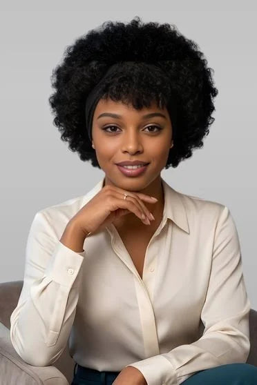 Woman wearing a white shirt against a gray background