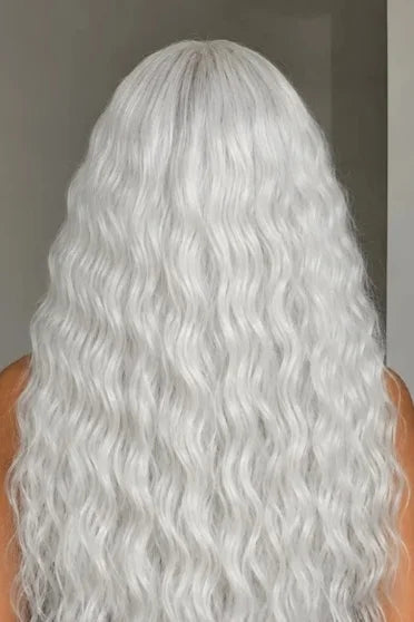 Blonde Bohemian 150% Density Curly Lace Wig - back view of long wavy silver-blonde curly wig with center part